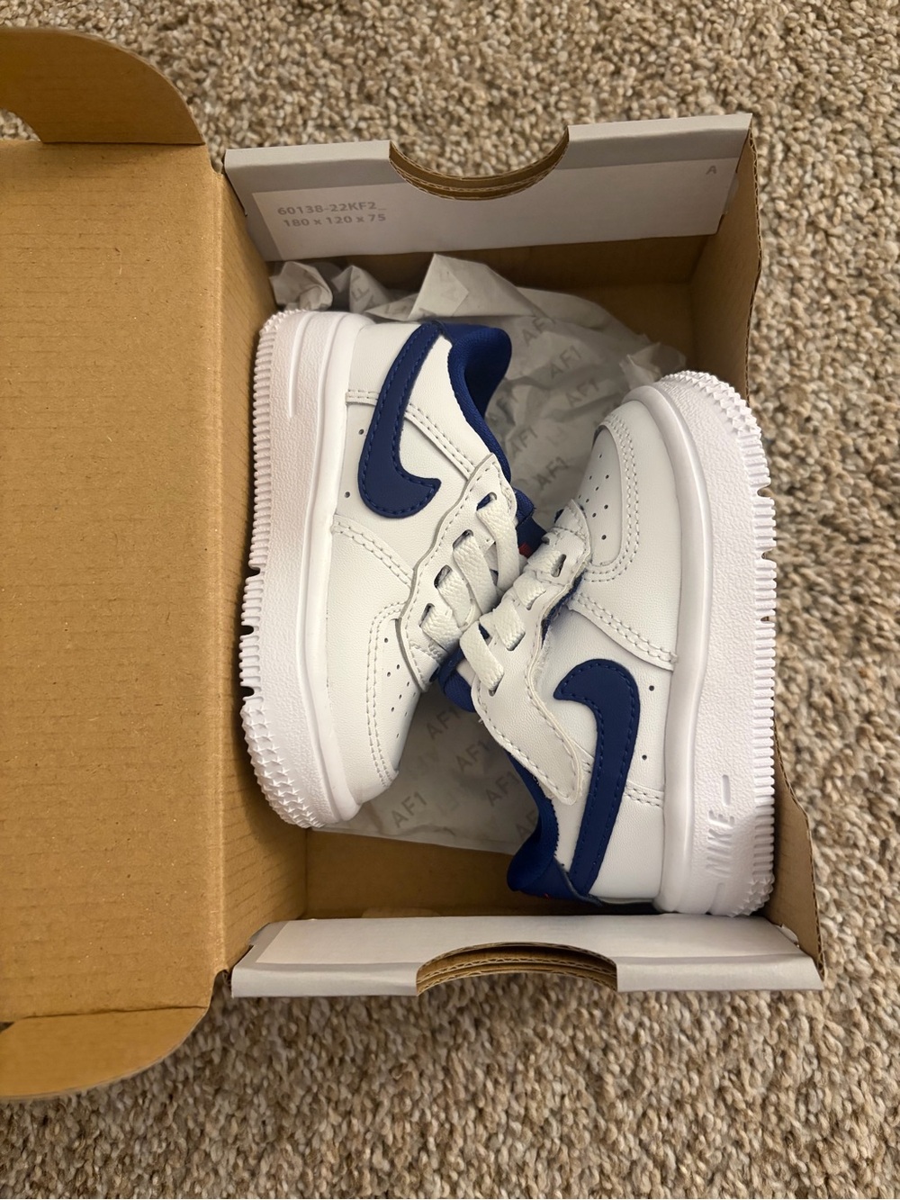 Nike Kids White Sneakers with Navy Swoosh